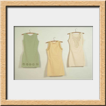 Temporelli Mabel - Agridulces - 3 vestidos instalados  sobre pared - 2006 - medidas variables- t�cnica y materiales costura y quemaduras de cigarrillos sobre telas de vestir femenina